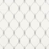 DISO by David Oliver for Schumacher, blue trellis pattern wallpaper in a bedroom setting
