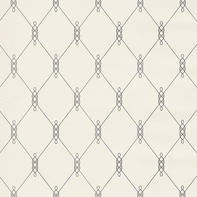 DISO Parchment trellis pattern wallpaper by Schumacher, designed by David Oliver, shown in a bedroom setting.