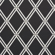 ASOLO Charcoal trellis wallpaper by Schumacher, designed by David Oliver, featuring a bold argyle-inspired geometric pattern.