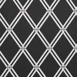 ASOLO Charcoal trellis wallpaper by Schumacher, designed by David Oliver, featuring a bold argyle-inspired geometric pattern.