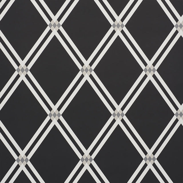 ASOLO Charcoal trellis wallpaper by Schumacher, designed by David Oliver, featuring a bold argyle-inspired geometric pattern.