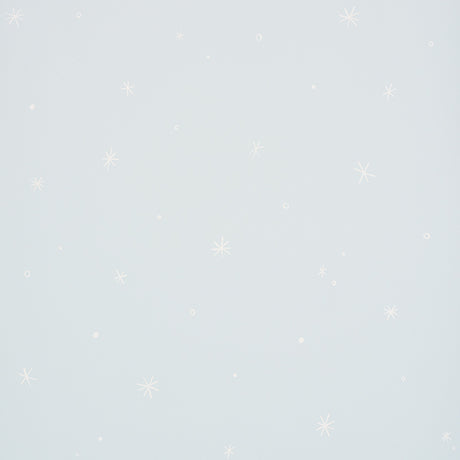 Calisto Mineral wallpaper by Schumacher featuring a subtle star and dot pattern on a pale blue background.