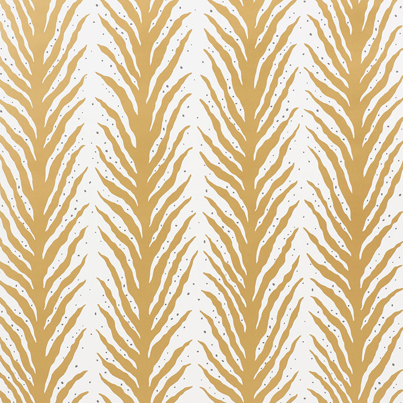 Creeping Fern wallpaper in gold by Schumacher, designed by Celerie Kemble, featuring a bold, organic fern stripe pattern.