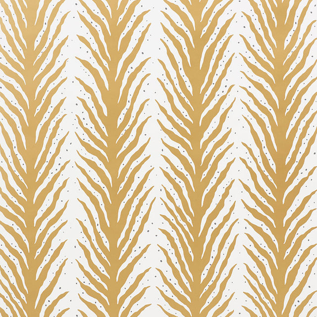 Creeping Fern wallpaper in gold by Schumacher, designed by Celerie Kemble, featuring a bold, organic fern stripe pattern.