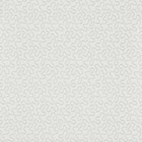 Meander Haze by Schumacher - Subtle abstract squiggle pattern wallpaper in a soft haze color, shown in a styled bedroom setting.