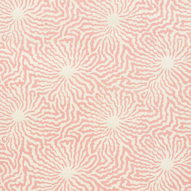 Flower Shock Sisal wallpaper in Peony by Celerie Kemble for Schumacher. Abstract floral pattern in pink on woven grasscloth ground.