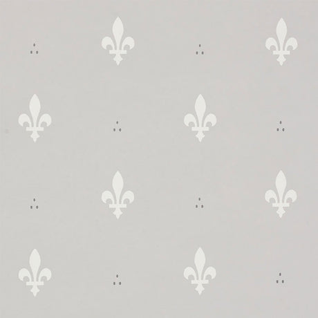 Grey wallpaper with a classic white fleur de lis pattern by Schumacher, shown both as a close-up and installed in a traditional room.
