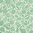 Chrysanthemum green floral wallpaper by Schumacher, shown in a bedroom setting and as a close-up pattern.