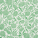 Chrysanthemum green floral wallpaper by Schumacher, shown in a bedroom setting and as a close-up pattern.