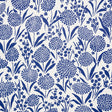 Chrysanthemum blue floral small-print wallpaper by Schumacher shown in detail and installed in a bedroom setting.