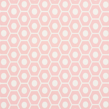 QUEEN B geometric pink and white hexagon wallpaper by Schumacher, shown in a styled interior and close-up pattern view.