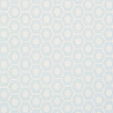 Queen B Mineral geometric hexagon wallpaper by Schumacher, shown in a modern interior setting.