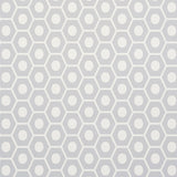 QUEEN B wallpaper in grey by Schumacher, featuring a modern geometric honeycomb pattern.