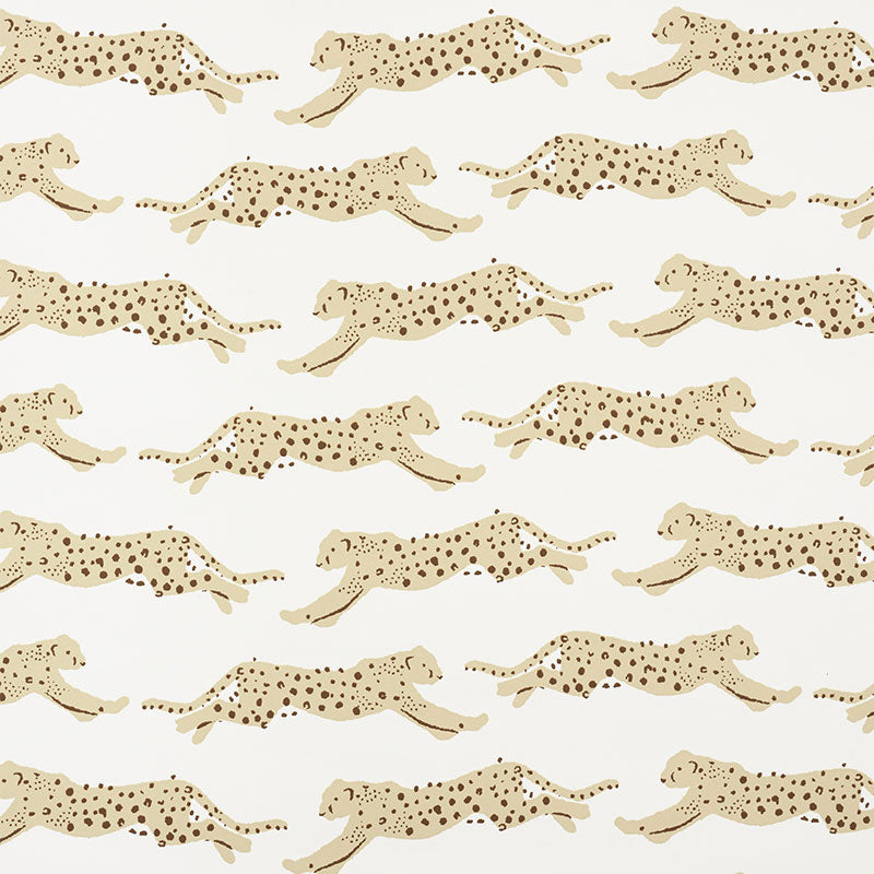 Leaping Leopards Sand wallpaper by Schumacher featuring rows of stylized leopards in motion on a neutral background.
