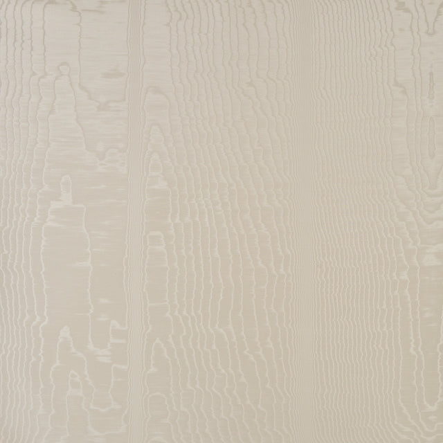 Moire wallcovering in parchment colorway with a watery, irregular appearance and delicate faille weave, by Schumacher.