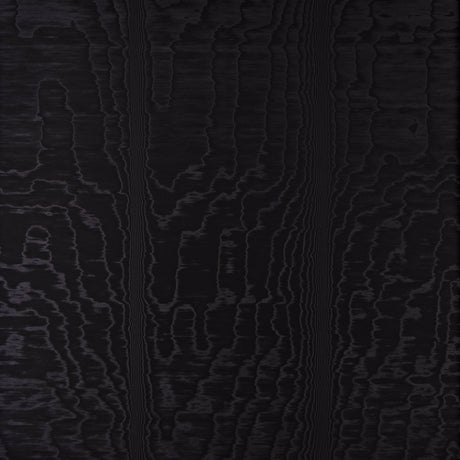 Moire Noir wallcovering with a watery, irregular moiré pattern and delicate faille weave, shown in a modern interior setting.