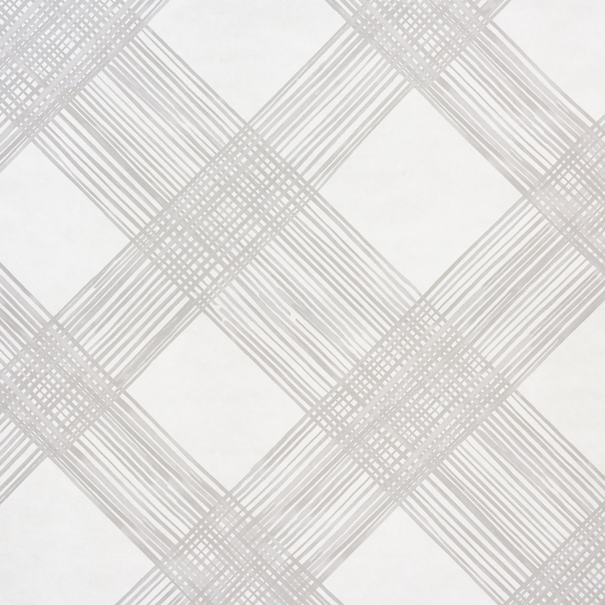 Hand-painted look trellis pattern wallpaper in linen color by Porter Teleo for Schumacher