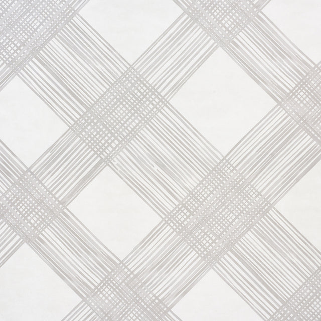Hand-painted look trellis pattern wallpaper in linen color by Porter Teleo for Schumacher