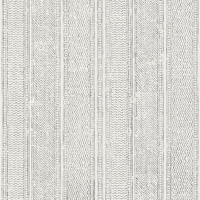 Mohave Carbon by Schumacher - Delicate handblocked stripe wallpaper in black and white, shown in a modern bedroom setting.