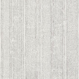 Mohave Carbon by Schumacher - Delicate handblocked stripe wallpaper in black and white, shown in a modern bedroom setting.