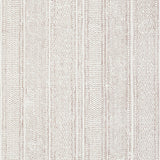 Mohave Sepia wallpaper by Schumacher features delicate, handblocked-inspired stripes with irregular jags in a sepia colorway.