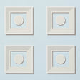 Marcel Sky geometric trompe l'oeil wallpaper by Schumacher, featuring stylized architectural panels in blue and white.