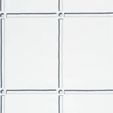 La Galerie wallpaper in ivory by Schumacher, featuring a stylized panel design with gestural black and white strokes.