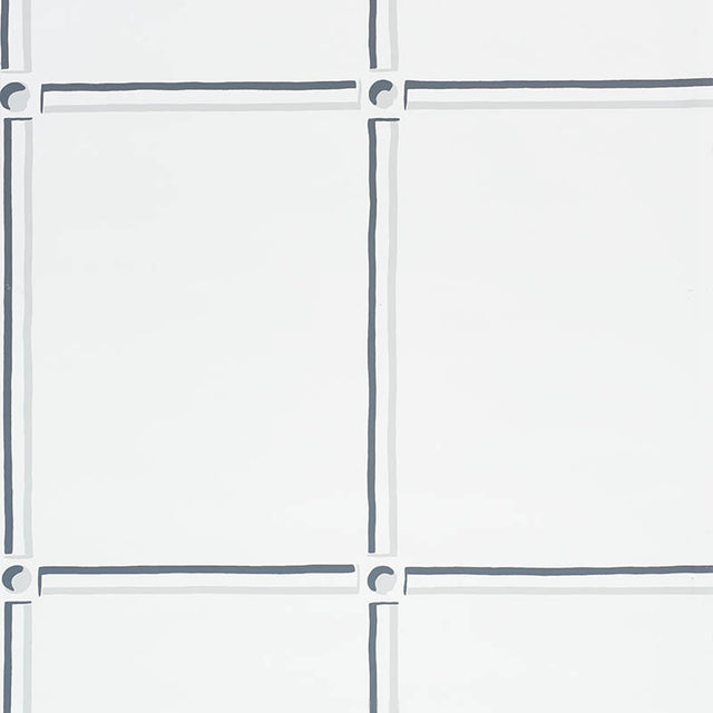 La Galerie wallpaper in ivory by Schumacher, featuring a stylized panel design with gestural black and white strokes.
