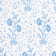 Khilana Floral Porcelain wallpaper by Schumacher, a large-scale blue and white floral pattern inspired by traditional Indian motifs.