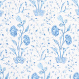 Khilana Floral Porcelain wallpaper by Schumacher, a large-scale blue and white floral pattern inspired by traditional Indian motifs.