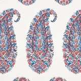 Shirala Paisley wallpaper in Delft & Rose by Schumacher, featuring a traditional Indian block print paisley design in blue and rose tones.