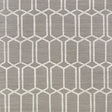 Modern Trellis Sisal wallpaper in charcoal by Schumacher, featuring a handprinted geometric trellis pattern on textured sisal.