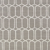 Modern Trellis Sisal wallpaper in charcoal by Schumacher, featuring a handprinted geometric trellis pattern on textured sisal.