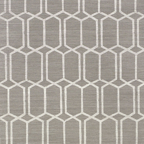 Modern Trellis Sisal wallpaper in charcoal by Schumacher, featuring a handprinted geometric trellis pattern on textured sisal.
