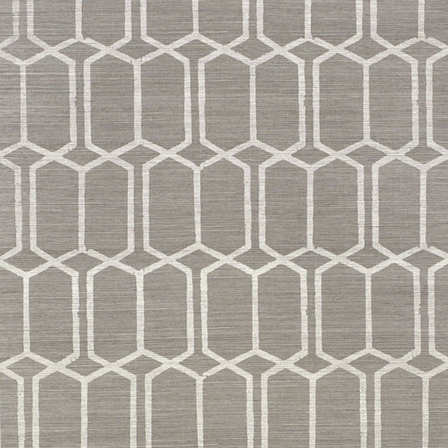 Modern Trellis Sisal wallpaper in charcoal by Schumacher, featuring a handprinted geometric trellis pattern on textured sisal.
