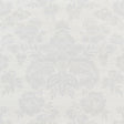 Simone Damask Grasscloth wallpaper in silver, featuring a classic damask pattern printed on textured grasscloth, styled in a modern bedroom setting.
