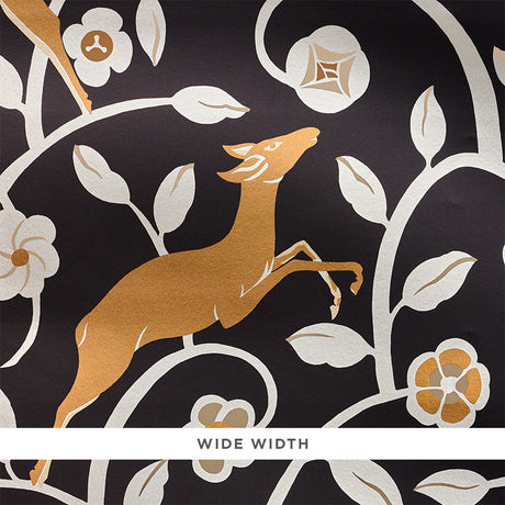 Art Deco style wallpaper featuring leaping gazelles and foliage in gold and cream on a noir (black) background, Les Gazelles au Bois by Schumacher.