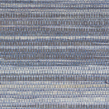 Dyed Raffia Slate textured woven wallcovering by Schumacher, showing irregular horizontal stripes and natural raffia fibers.