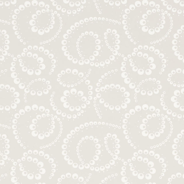 Dorian Dove abstracted botanical swirl wallpaper by Schumacher, shown in a soft neutral colorway with a multi-directional pattern.