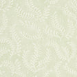 Etched Fern Leaf wallpaper in a soft green leaf colorway with a delicate fern motif, shown in a styled bedroom setting.