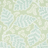 Estelle wallpaper in green by Schumacher, featuring bold stylized floral pattern in a contemporary Arts & Crafts style.