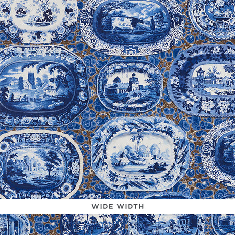 Blue and white trompe l'oeil wallpaper featuring transferware plates and platters on a marbleized background, styled in a kitchen setting.