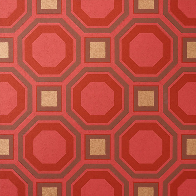 HANOVER Ruby geometric lattice wallpaper by Schumacher, bold red and gold octagonal and square pattern, surface-printed for rich depth.