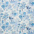 Persian Lancers Porcelain wallpaper by Schumacher featuring blue and white hand-blocked style equestrian and floral motifs.