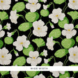 Nasturtium Noir floral wallpaper with large white flowers and green leaves on a black background by Schumacher