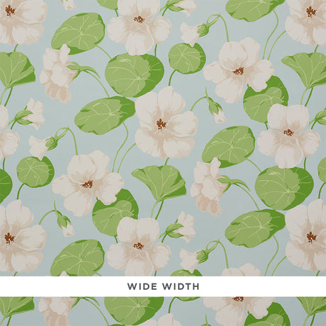Nasturtium Sky by Schumacher - large scale floral wallpaper with white flowers and green leaves on a blue background