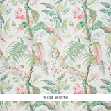 Tropique Blush by Schumacher - painterly tropical botanical wallpaper with interwoven blossoms, leaves, and branches in blush and green.