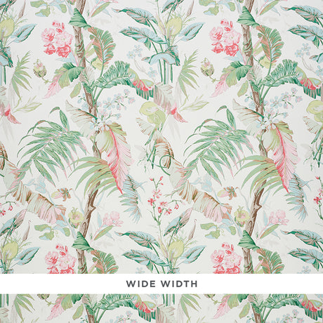 Tropique Blush by Schumacher - painterly tropical botanical wallpaper with interwoven blossoms, leaves, and branches in blush and green.