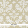 Regalia Sisal wallpaper in Ivory on Natural by Schumacher, featuring mirrored lions and stylized flowers on textured grasscloth.