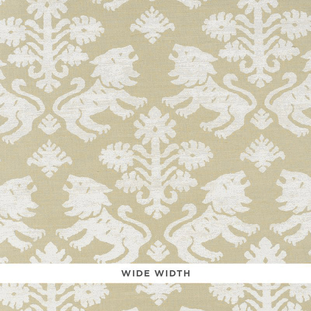 Regalia Sisal wallpaper in Ivory on Natural by Schumacher, featuring mirrored lions and stylized flowers on textured grasscloth.
